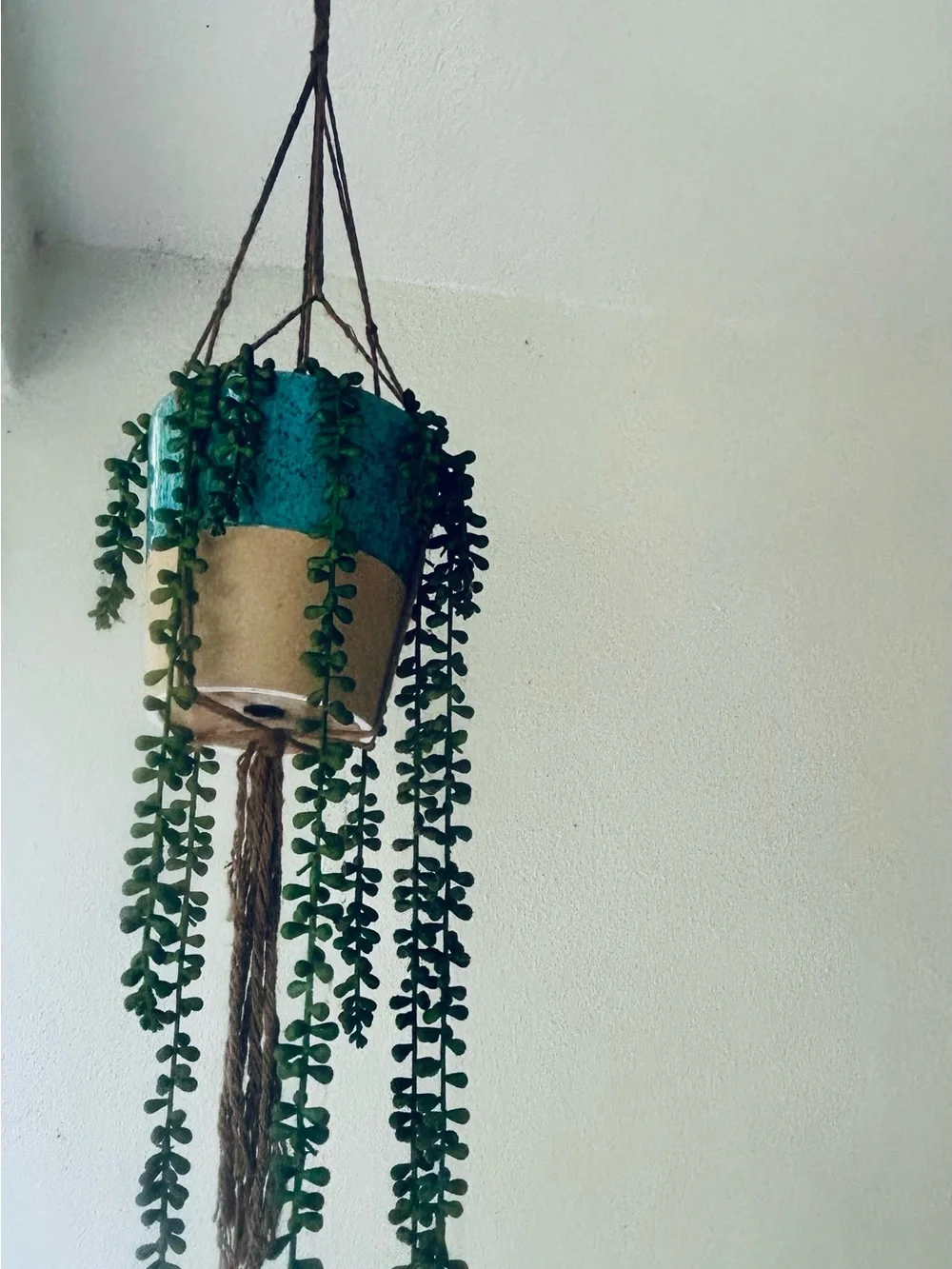 Boho Hanging Planter – Teal & Tan Ceramic Pot with Faux String artificial plant.